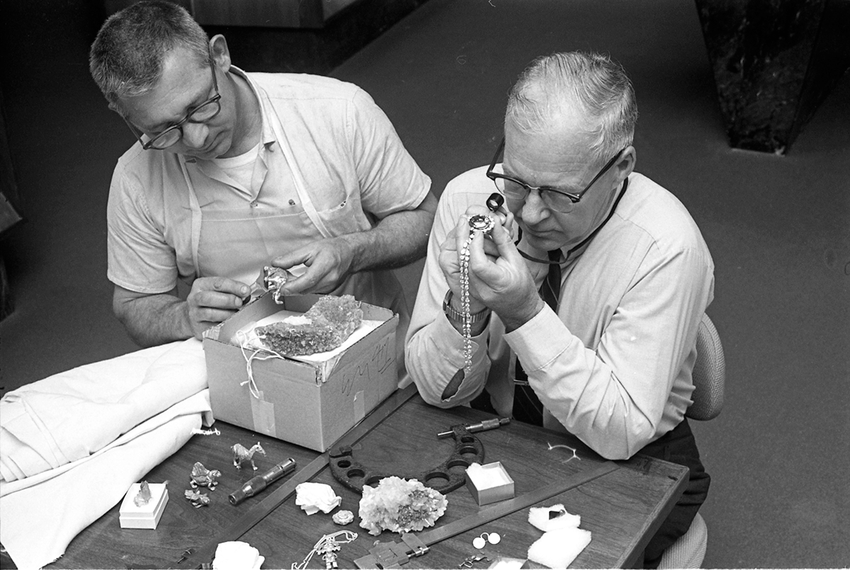 Smithsonian Institution Archives. Dr. George Switzer, Chairman of the Department of Mineral Sciences at Museum of Natural History, with Hope Diamond.